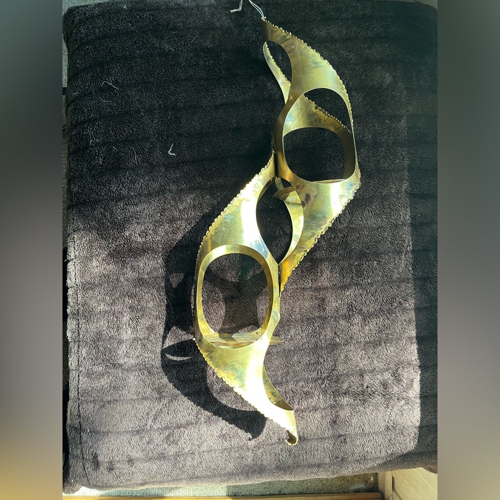Large Brass sculpture hanging plant holder.